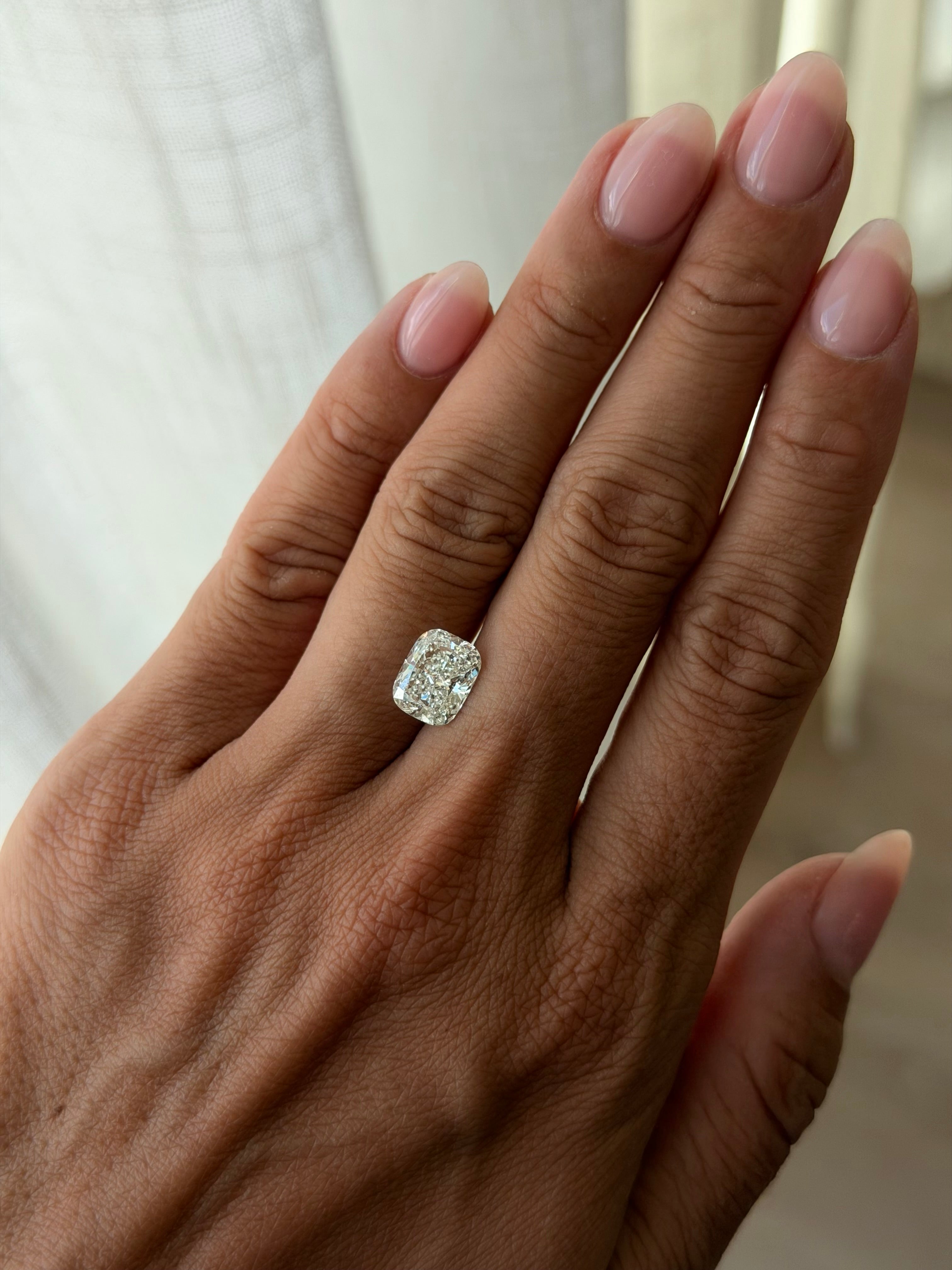 Elongated Cushion Brilliant H color, 3.02ct